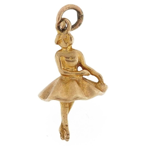 307 - A 9ct gold charm in the form of a ballerina, 2cm high, 1.6g.