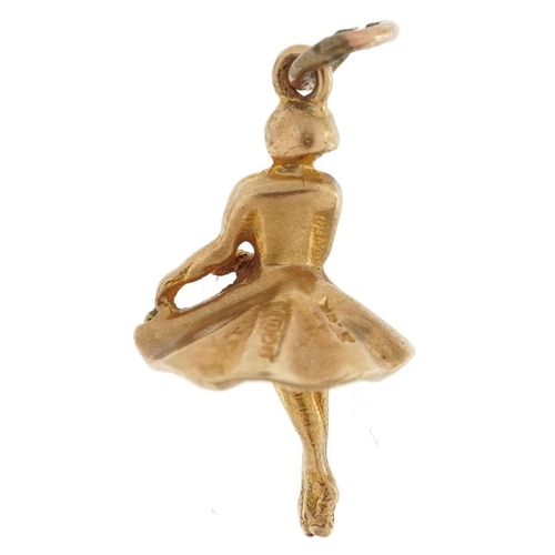 307 - A 9ct gold charm in the form of a ballerina, 2cm high, 1.6g.