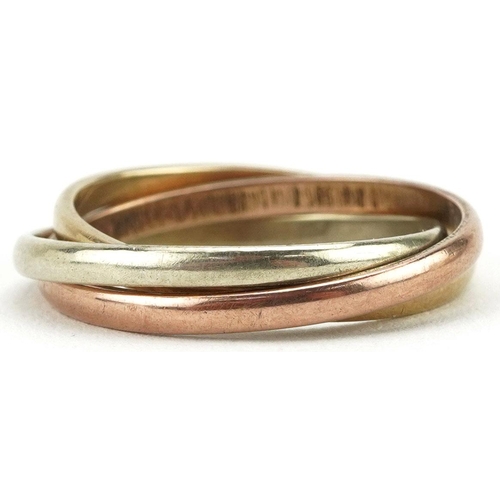 575 - A 9ct three tone gold Russian wedding ring, size K, 3.2g