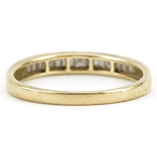 134 - A 9ct gold diamond half eternity ring, total diamond weight approximately 0.25 carat, size O, 1.6g.