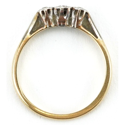 130 - An 18ct gold diamond three stone ring, size L/M, 2.0g.