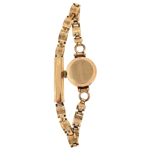 184 - Kienzle, a ladies 9ct gold cased manual wind wristwatch with gold plated strap, 16mm in diameter.