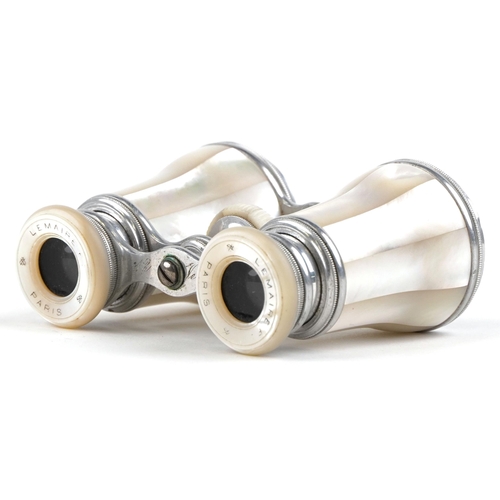 1343 - A pair of early 20th century French mother-of-pearl opera glasses by Lemaire, Paris, 11cm wide.