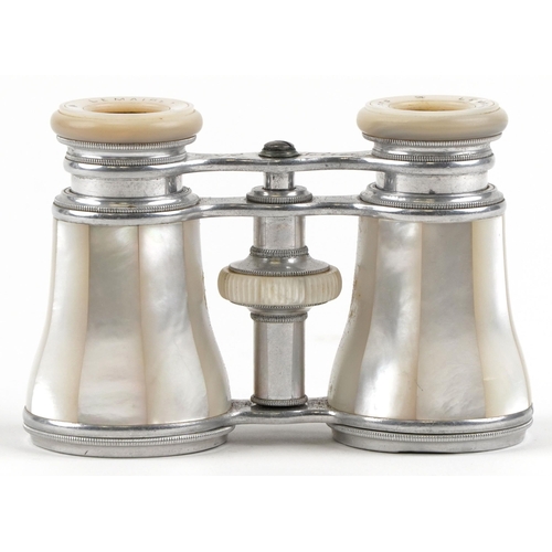 1343 - A pair of early 20th century French mother-of-pearl opera glasses by Lemaire, Paris, 11cm wide.