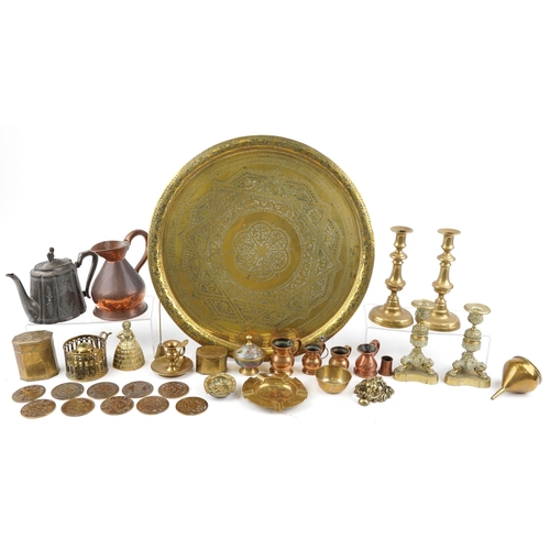 1370 - A mixed group of 20th century brass and copperware to include two pairs of candlesticks, chamberstic... 