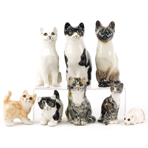 406 - A collection of seven Winstanley studio pottery figures of cats, the largest 21cm high, together wit... 