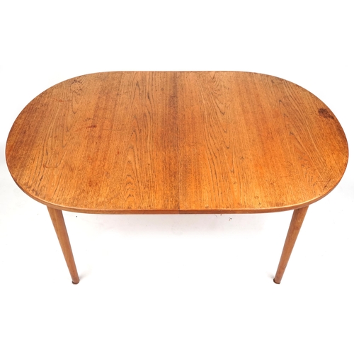 1014 - A mid 20th century teak extending dining table with two extra leaves, 73cm H x 156cm W x 100cm D, to... 