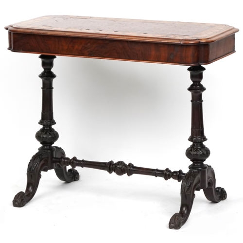 1074 - A mid Victorian walnut centre table with inlaid decoration, raised on carved supports, 70cm H x 86cm... 