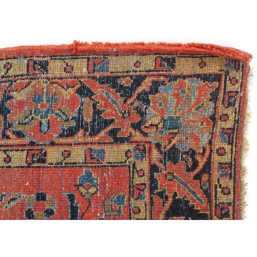 1039 - A Sarouk rug, North West Persia, mid 20th century, the charcoal field with a central stylized medall... 