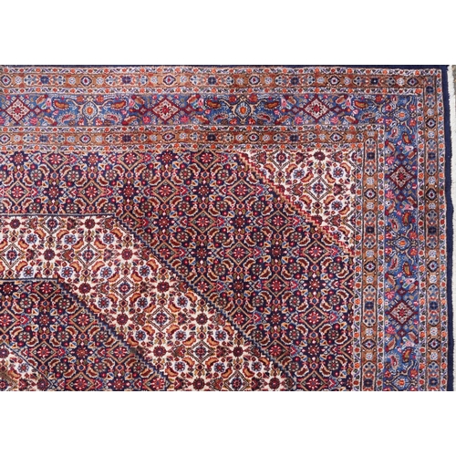 1018 - A Bidjar carpet, North West Persia, mid 20th century, the midnight blue field with a central stylize... 