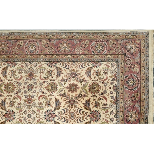  A Nain carpet, North West Persia, late 20th century, the ivory field with stylized flowers within a ... 