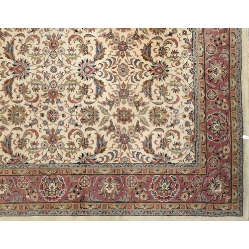  A Nain carpet, North West Persia, late 20th century, the ivory field with stylized flowers within a ... 