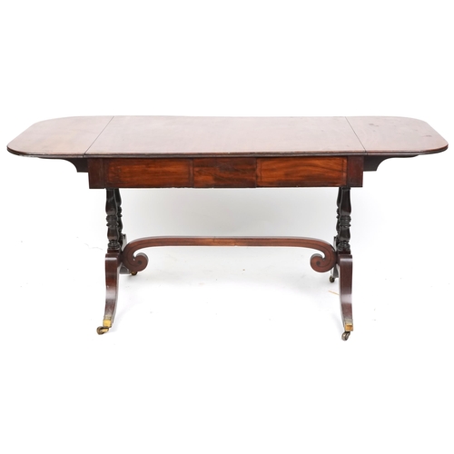 1073 - An early 19th century mahogany sofa table fitted with two frieze drawers raised on sabre legs, 70cm ... 