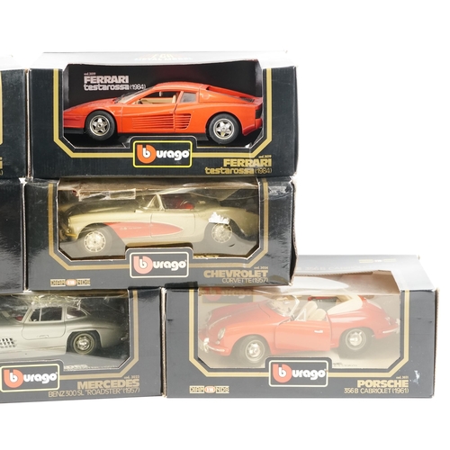 518 - Seven Burago diecast model sports cars including Porsche, Mercedes and Ferrari.