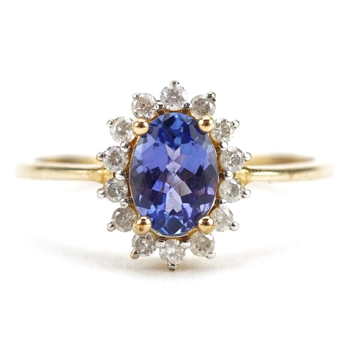 A 9ct gold tanzanite and diamond cluster ring, the tanzanite approximately 7.0mm x 4.95mm x 3.0mm deep, size O, 2.0g.