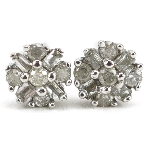 395 - A pair of 9ct white gold diamond cluster stud earrings, 4.4mm in diameter, total 0.8g.