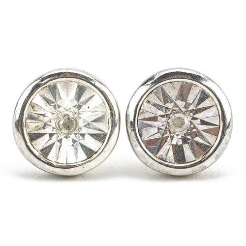 362 - A pair of silver diamond solitaire stud earrings, 6.6mm in diameter, total 1.3g.