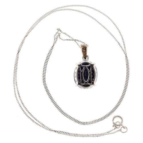 361 - A white gold sapphire solitaire pendant on a 9ct white gold necklace, the sapphire approximately 11.... 