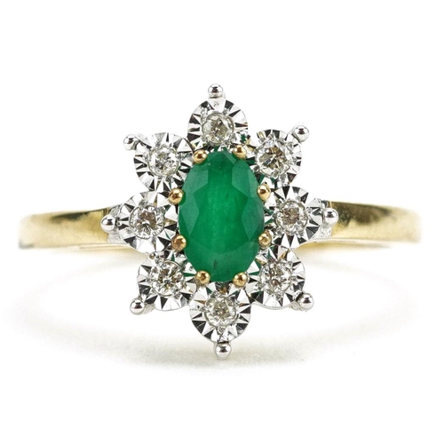 311 - A 9ct gold emerald and diamond flower head ring, total diamond weight approximately 0.10 carat, size... 