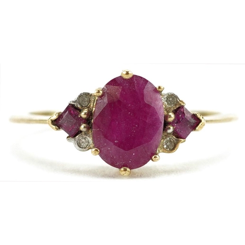 447 - A 9ct gold ruby and diamond cluster ring, size P, 2.0g.