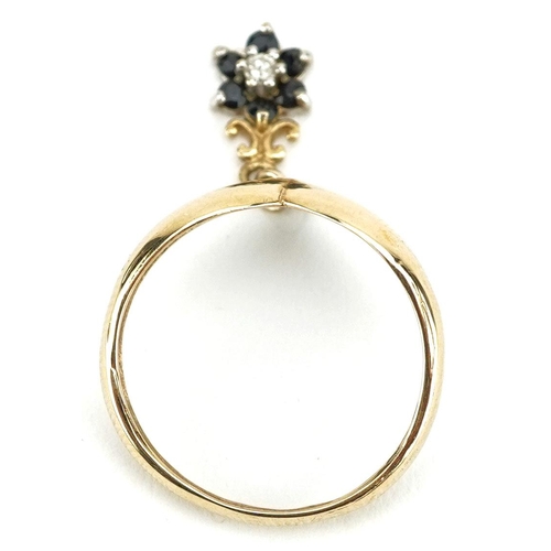 203 - A 9ct gold wishbone ring with diamond and sapphire flower head drop, size M, 1.8g.