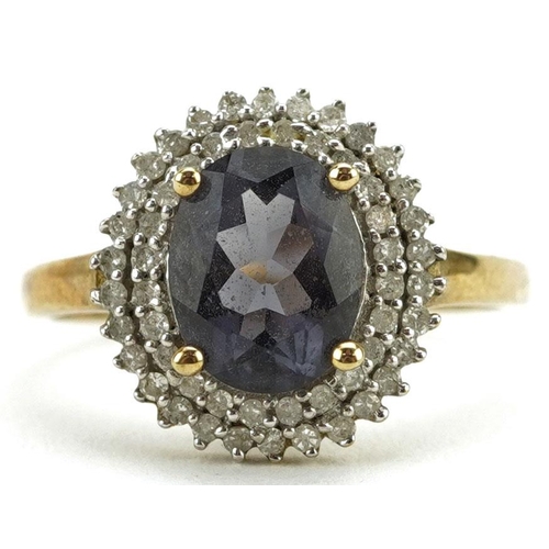 346 - A 9ct gold blue/purple stone and diamond three tier cluster ring, size P, 2.5g.