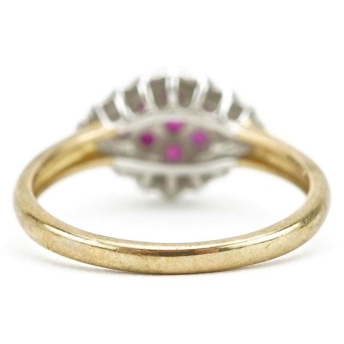 148 - A 9ct gold ruby and diamond two tier cluster ring, size P, 2.7g.