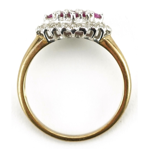 148 - A 9ct gold ruby and diamond two tier cluster ring, size P, 2.7g.