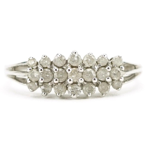 358 - A 9ct white gold three row diamond cluster ring, size P, 2.2g.