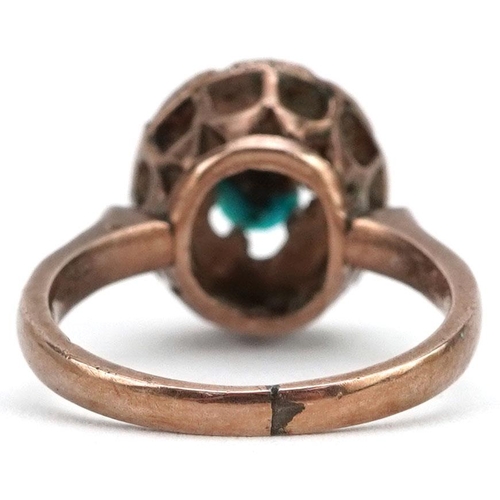 93 - An antique unmarked gold cabochon turquoise and old cut diamond cluster ring with pierced setting, s... 