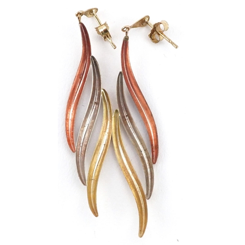 145 - A pair of 9ct three tone gold drop earrings, 5cm high, total 0.9g.