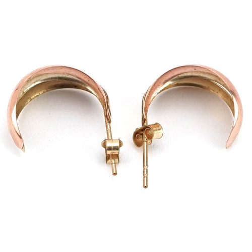 474 - A pair of 9ct three tone gold half hoop earrings, 1.4cm high, total 0.8g.