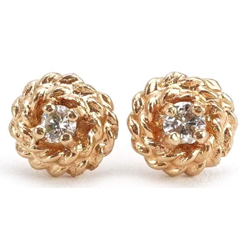 431 - A pair of 9ct gold diamond solitaire stud earrings, 5.6mm in diameter, 0.8g.