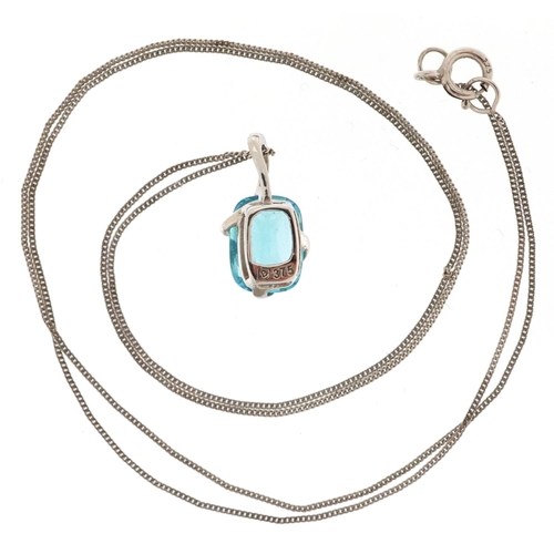 135 - A 9ct white gold blue topaz pendant on a 9ct white gold necklace, the topaz approximately 7.90mm x 6... 