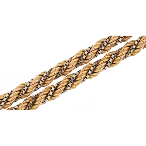  A 9ct two tone gold rope twist necklace, 47cm in length, 23.0g.