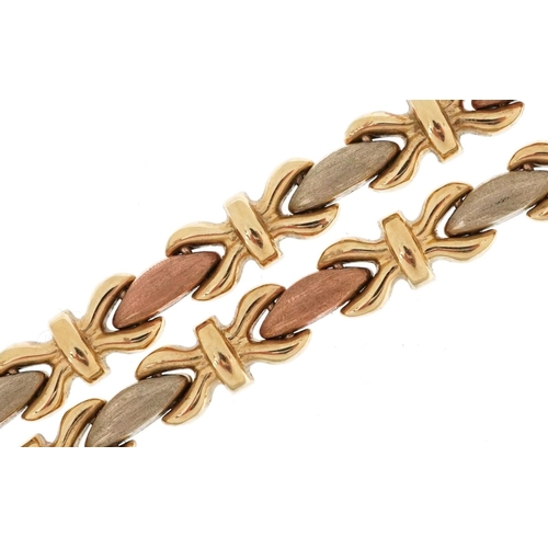  A Modernist 9ct three tone gold necklace, 40cm in length, 22.0g.