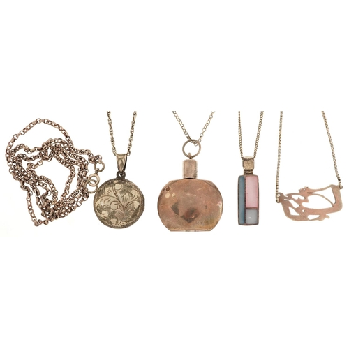 580 - Five silver necklaces, four with pendants, including miniature scent bottle and a locket, total 32.0... 