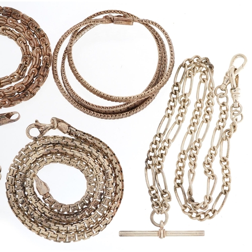 603 - Five silver necklaces including one with a T-bar, total 118.0g.