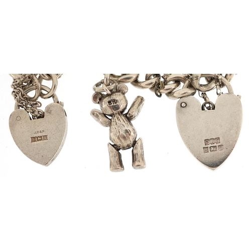 606 - Two silver bracelets with love heart padlock clasps, two silver ingot pendants and a silver Belcher ... 