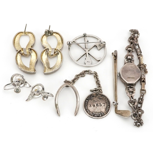 588 - Antique and later silver jewellery including a ladies marcasite wristwatch, two golfing interest bro... 