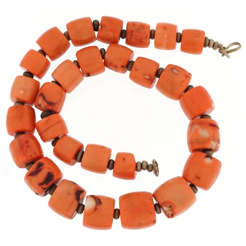 611 - A large natural coral segment necklace, 50cm in length, 197.5g.