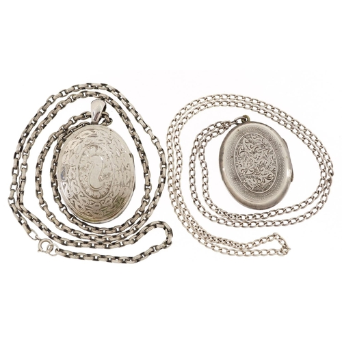 607 - Two Victorian white metal oval lockets with engraved decoration, one with silver necklace and one wi... 