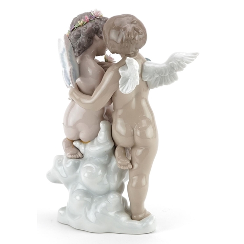  A Lladro figure group of Putti - Heaven & Earth, numbered 3366, 29cm high.