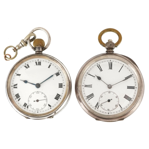 612 - Two gentlemen's silver open pocket watches, each having enamelled and subsidiary dials with Roman an... 