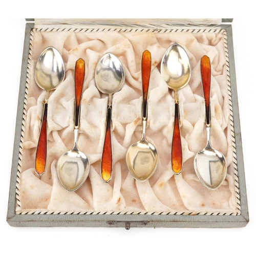 701 - A set of six Danish silver and guilloche enamel teaspoons housed in a velvet and silk lined fitted c... 