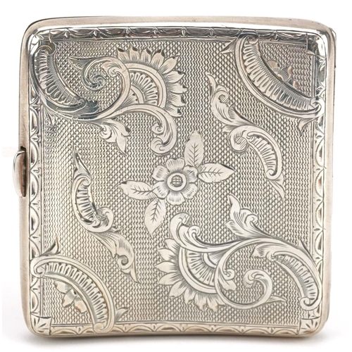  A Victorian silver cigarette case with engine turned and floral engraved decoration, Birmingham 1899... 