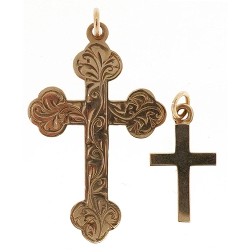 470 - Two 9ct gold cross pendants including one with floral engraved decoration, the largest 3.5cm high, t... 