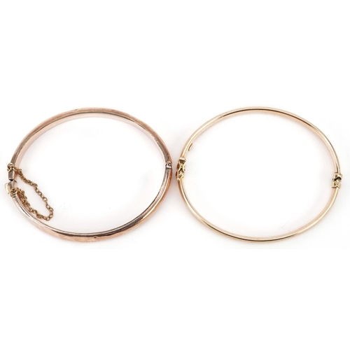 227 - Two 9ct gold hinged bangles, total 15.0g.