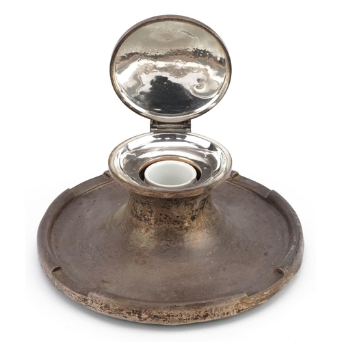 658 - A large circular silver Capstan inkwell, indistinct hallmarks, possibly Birmingham 1935, 20cm in dia... 