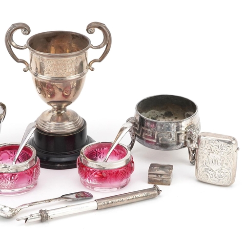 693 - A collection of antique and later silver and silver plated objects including a miniature silver two ... 